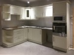 New cream kitchen with new units including fitted oven and microwave oven - Barrett Kitchens, Donegal